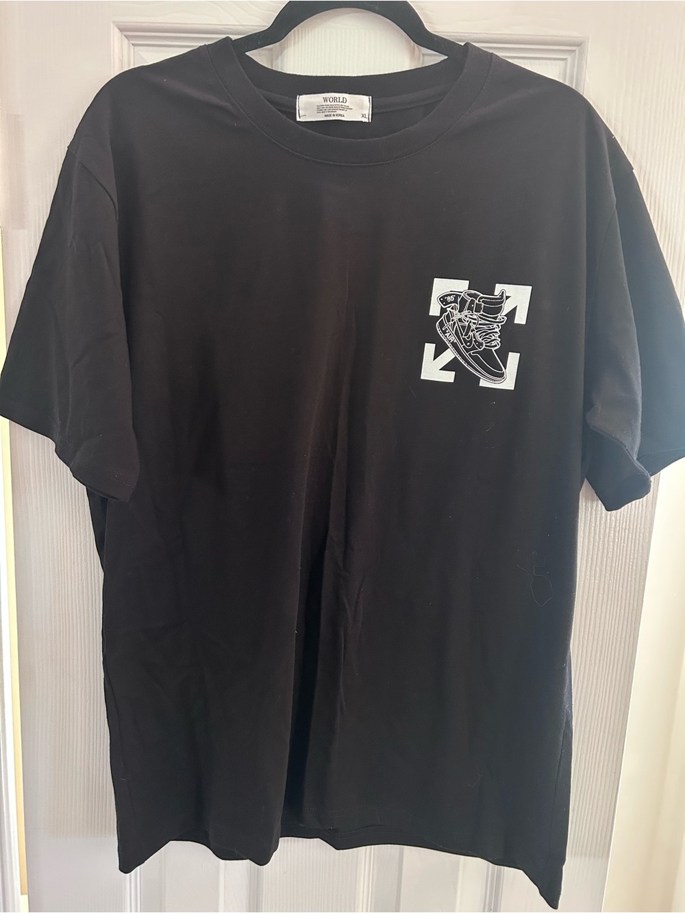 The World Black Short-Sleeve Tee with Vintage Nike Air Jordan Sneaker Graphic XL